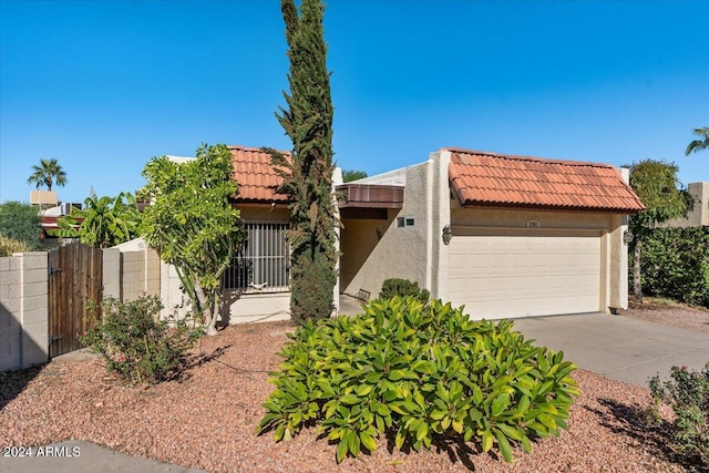 view of front of property featuring a garage