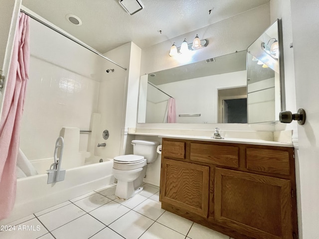 full bathroom with shower / bathing tub combination, vanity, tile patterned flooring, toilet, and a textured ceiling