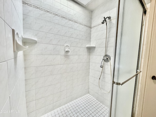 bathroom with an enclosed shower