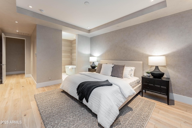 bedroom with recessed lighting, baseboards, light wood-style floors, and wallpapered walls
