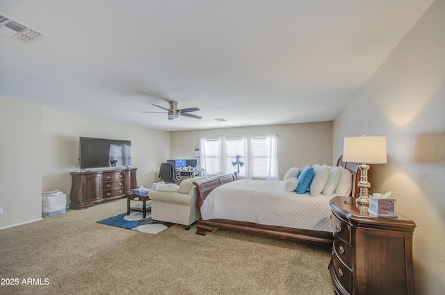 bedroom with ceiling fan, carpet floors, and visible vents