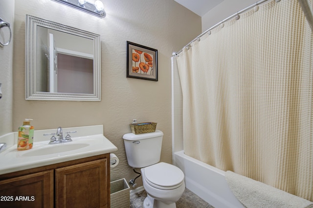 full bathroom featuring toilet, shower / tub combo with curtain, and vanity
