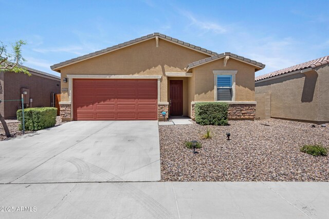 4628 W Greenleaf Dr, San Tan Valley, AZ 85144 - ranch-style house with concrete driveway, a garage, stucco siding, and stone siding