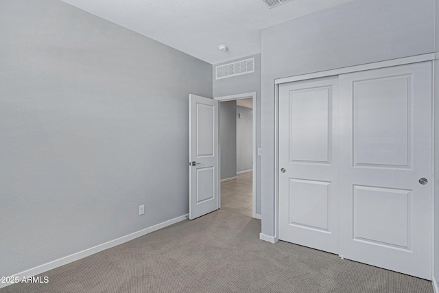 4628 W Greenleaf Dr, San Tan Valley, AZ 85144 - unfurnished bedroom featuring light carpet, baseboards, and a closet
