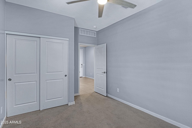 4628 W Greenleaf Dr, San Tan Valley, AZ 85144 - unfurnished bedroom with carpet flooring, a closet, baseboards, and a ceiling fan
