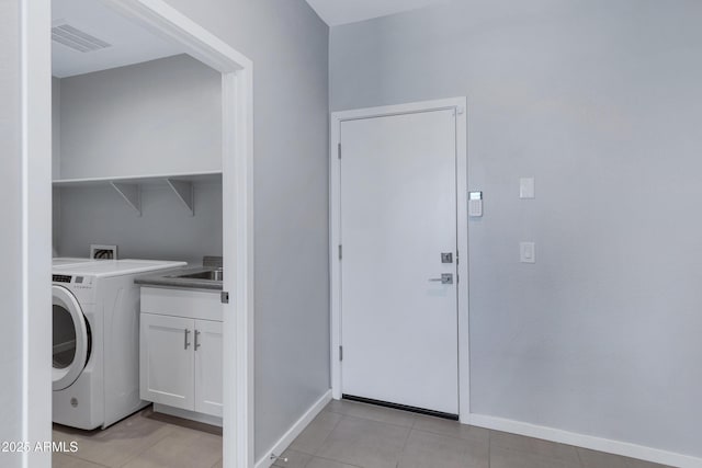 4628 W Greenleaf Dr, San Tan Valley, AZ 85144 - laundry area featuring washer / clothes dryer, baseboards, cabinet space, and light tile patterned floors