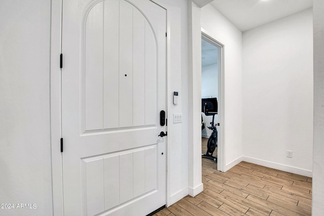 hallway with light wood-type flooring