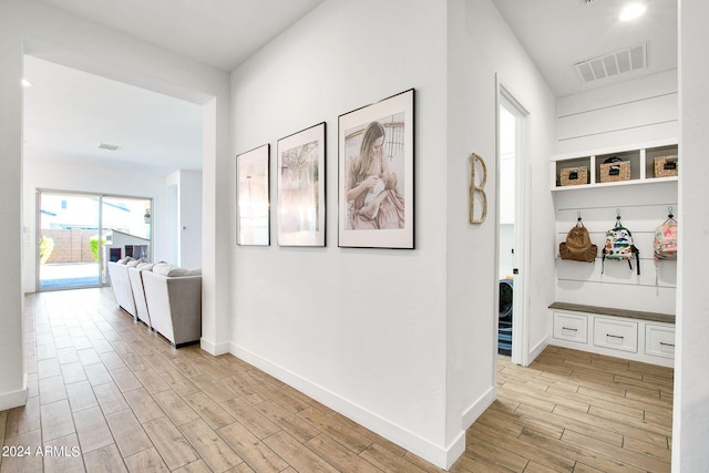 hallway featuring light hardwood / wood-style flooring