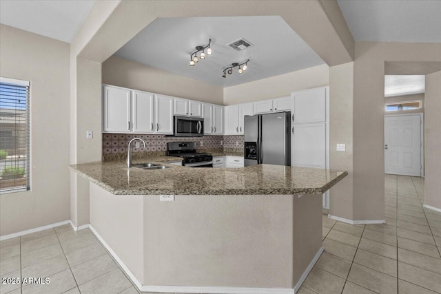 21192 E Stirrup St, Queen Creek, AZ 85142 - kitchen with a sink, light tile patterned flooring, tasteful backsplash, visible vents, and appliances with stainless steel finishes