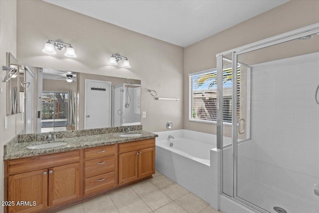 21192 E Stirrup St, Queen Creek, AZ 85142 - bathroom with a stall shower, tile patterned flooring, a sink, and a bath