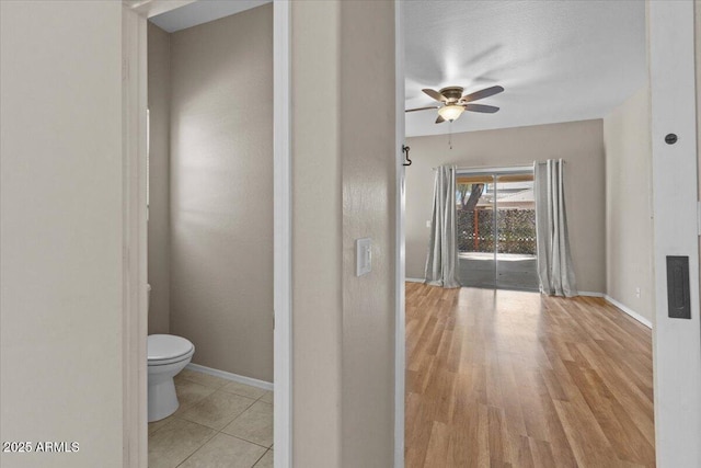 21192 E Stirrup St, Queen Creek, AZ 85142 - interior space with wood finished floors, ceiling fan, toilet, and baseboards
