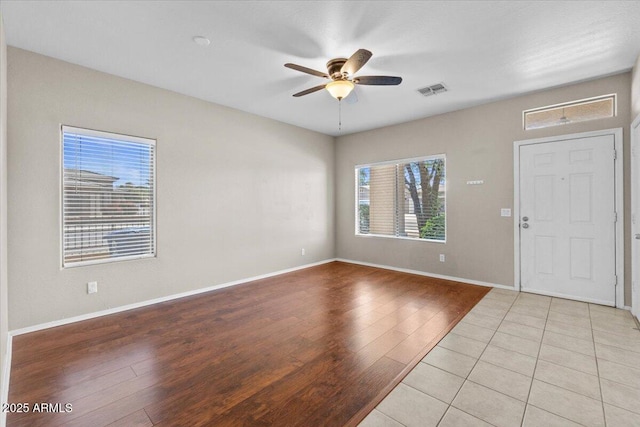 21192 E Stirrup St, Queen Creek, AZ 85142 - foyer featuring baseboards, visible vents, wood finished floors, and ceiling fan