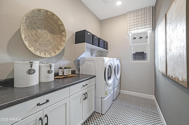 clothes washing area featuring washer and clothes dryer