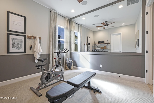 workout room featuring carpet floors and ceiling fan