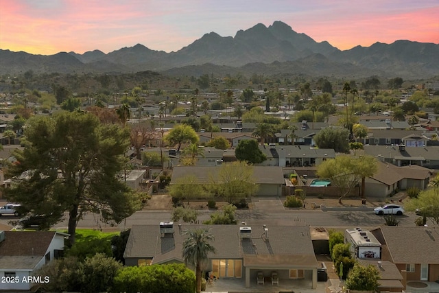 aerial view at dusk with a mountain view