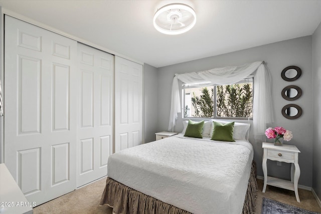 carpeted bedroom featuring a closet