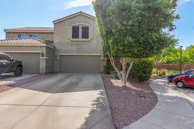13540 N 87th Dr, Peoria, AZ 85381 - view of front of house with stucco siding, a garage, driveway, and a tile roof