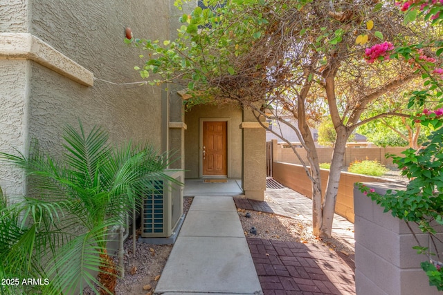 13540 N 87th Dr, Peoria, AZ 85381 - property entrance with stucco siding and central air condition unit
