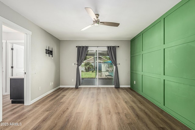 18820 N 33rd Ave, Phoenix, AZ 85027 - unfurnished bedroom with access to exterior, light wood-type flooring, and ceiling fan