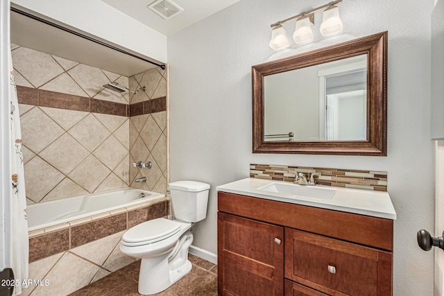 18820 N 33rd Ave, Phoenix, AZ 85027 - full bath featuring tiled shower / bath combo, vanity, tile patterned floors, and backsplash