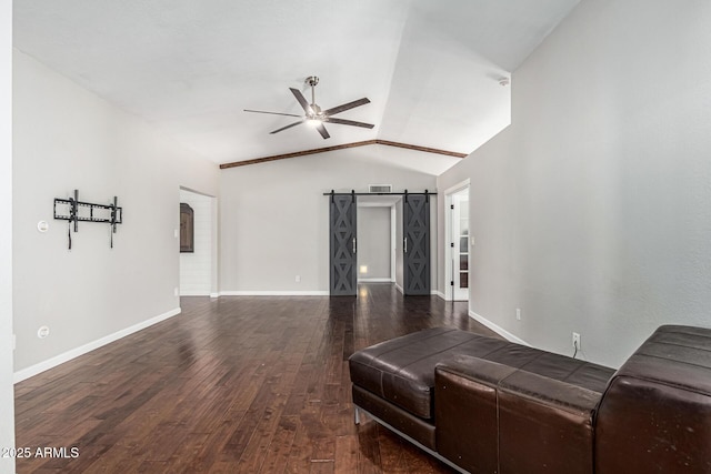 18820 N 33rd Ave, Phoenix, AZ 85027 - living area featuring ceiling fan, vaulted ceiling, wood finished floors, and a barn door