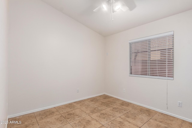 unfurnished room featuring light tile patterned flooring and ceiling fan