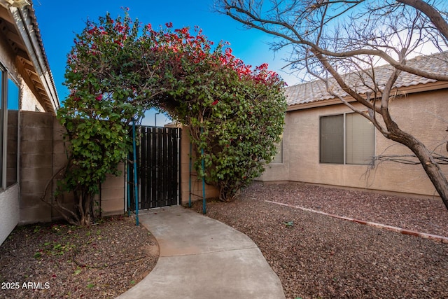 view of yard featuring a gate and fence