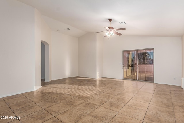 unfurnished room featuring vaulted ceiling, light tile patterned floors, and ceiling fan