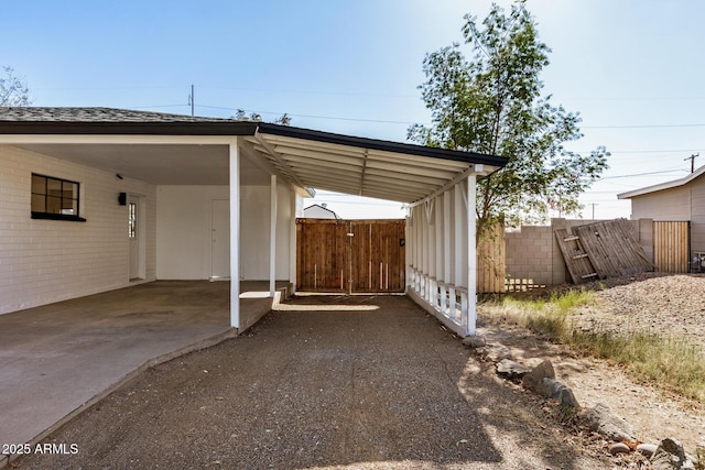 view of patio / terrace featuring a carport