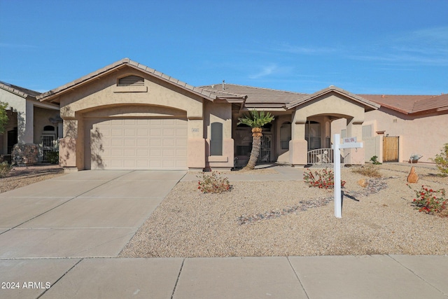 view of front of property with a garage