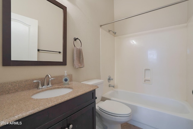 full bathroom with shower / bathing tub combination, vanity, and toilet