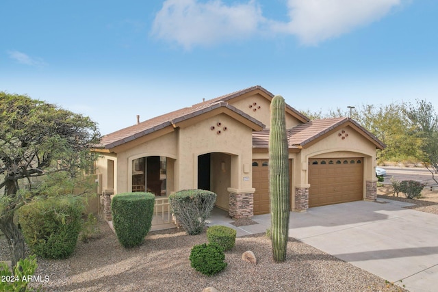 view of front of home with a garage