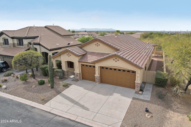 view of front of property featuring a garage