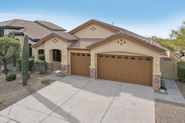 view of front of property with a garage