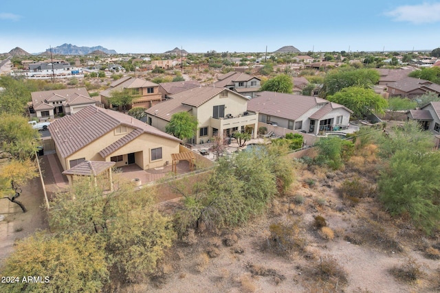 drone / aerial view featuring a mountain view