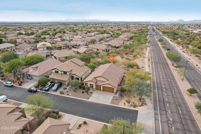 birds eye view of property featuring a mountain view