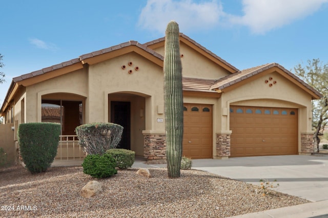 view of front of home with a garage