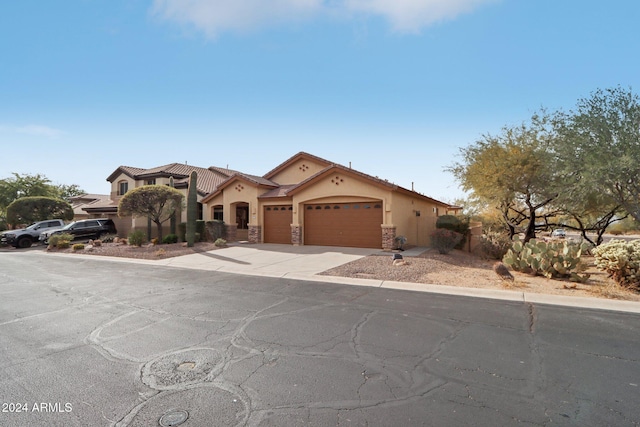 view of front of property featuring a garage