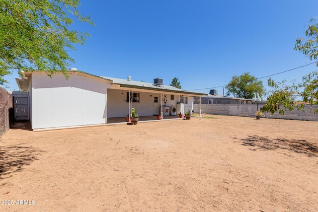 10012 N 16th Dr, Phoenix, AZ 85021 - back of property with a fenced backyard and a patio