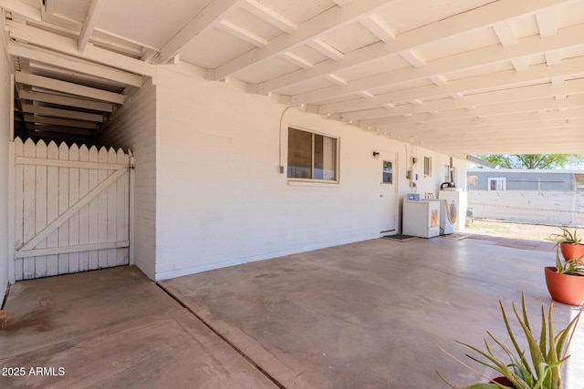 10012 N 16th Dr, Phoenix, AZ 85021 - view of patio / terrace featuring washer and dryer and fence