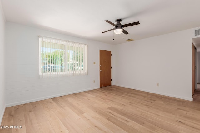 10012 N 16th Dr, Phoenix, AZ 85021 - unfurnished room with baseboards, ceiling fan, and light wood-style floors
