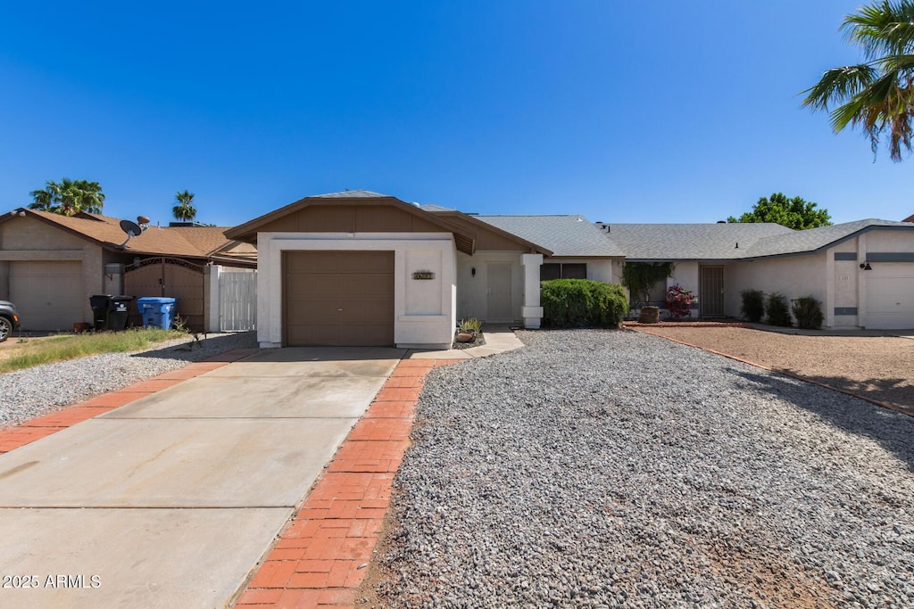 1633 E Beverly Ln, Phoenix, AZ 85022 - single story home with a garage, stucco siding, and driveway