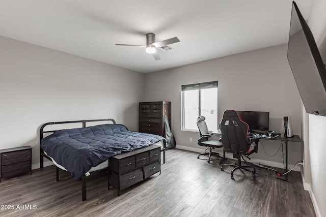 bedroom with ceiling fan and light hardwood / wood-style flooring