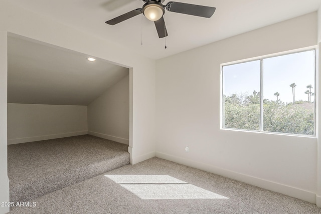 bonus room with carpet, vaulted ceiling, and baseboards