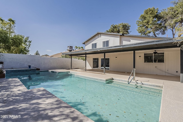 view of pool with central AC unit, a patio area, fence, and a fenced in pool