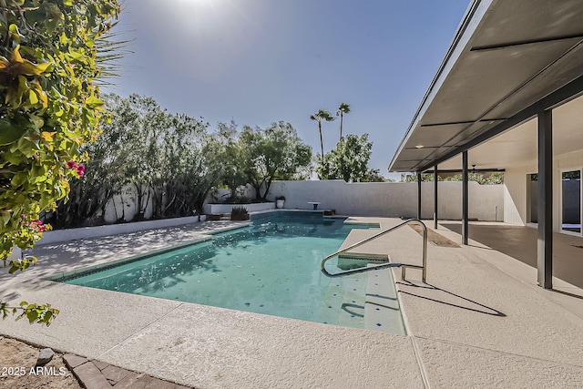 view of pool featuring a patio area, a fenced backyard, and a fenced in pool