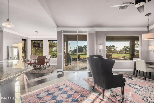 interior space featuring ceiling fan, light tile patterned floors, and crown molding