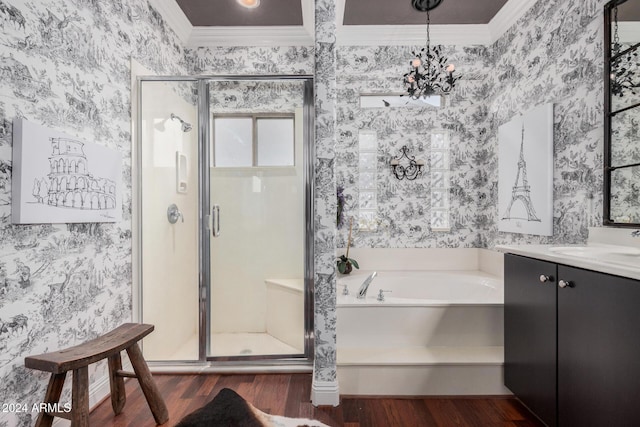 bathroom featuring wood-type flooring, shower with separate bathtub, crown molding, and a notable chandelier