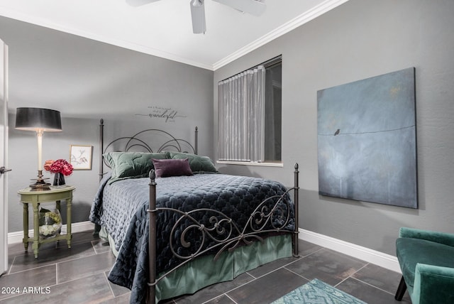 bedroom with ceiling fan and crown molding