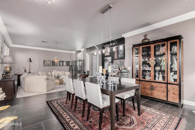 dining space with ornamental molding